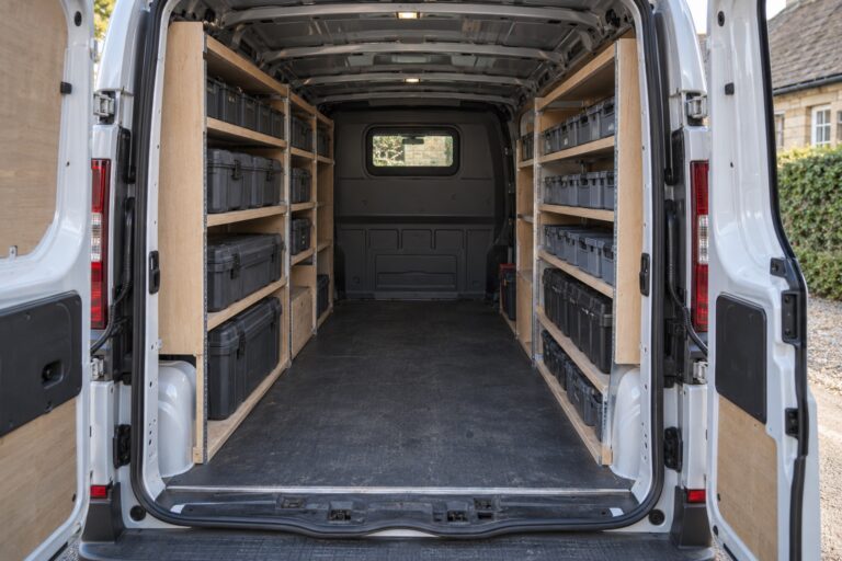Illustration of a parked work van with side shelving, closed cases and a clear central aisle
